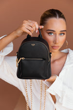 Load image into Gallery viewer,    Kyn black woman&#39;s vegan leather backpack
